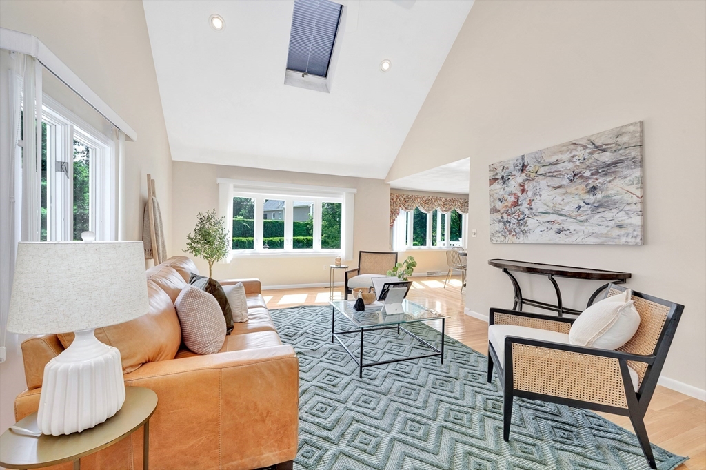 443 A North Road Bedford, MA 01730 - Photo 14 of 36 a living room with furniture and a window