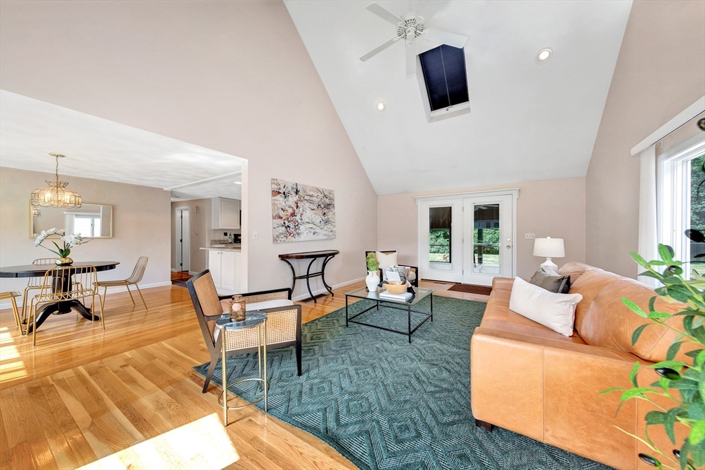 443 A North Road Bedford, MA 01730 - Photo 15 of 36 a living room with furniture and a flat screen tv