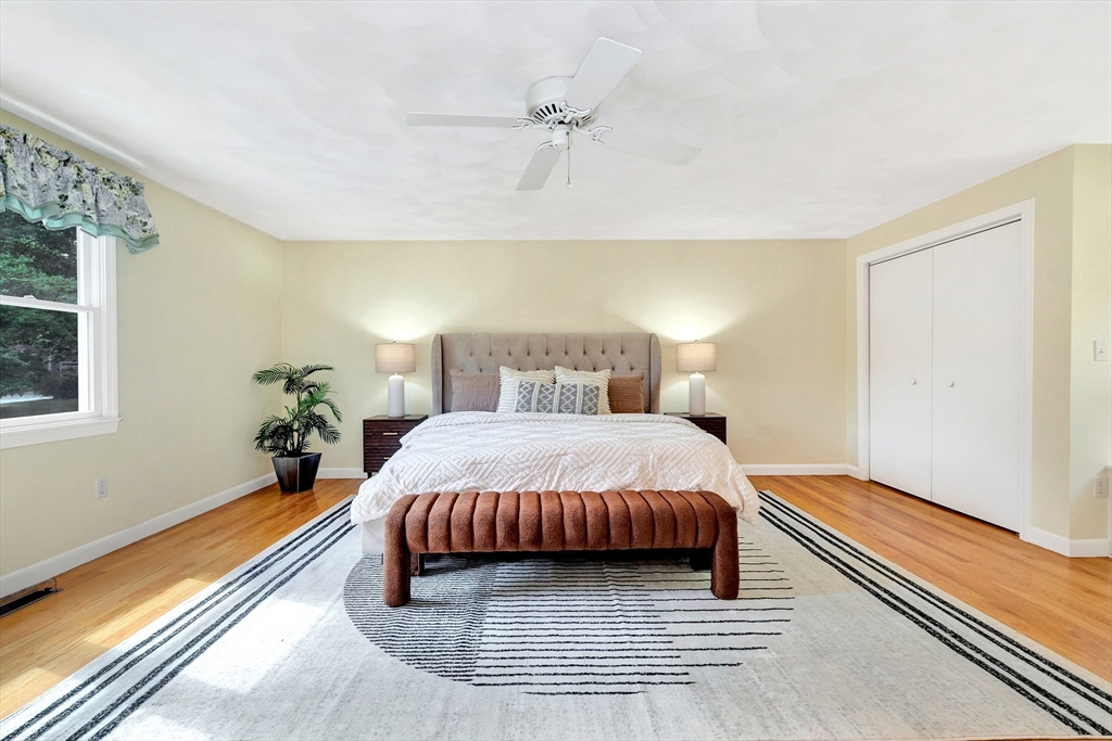 443 A North Road Bedford, MA 01730 - Photo 19 of 36 a bedroom with a bed and a window