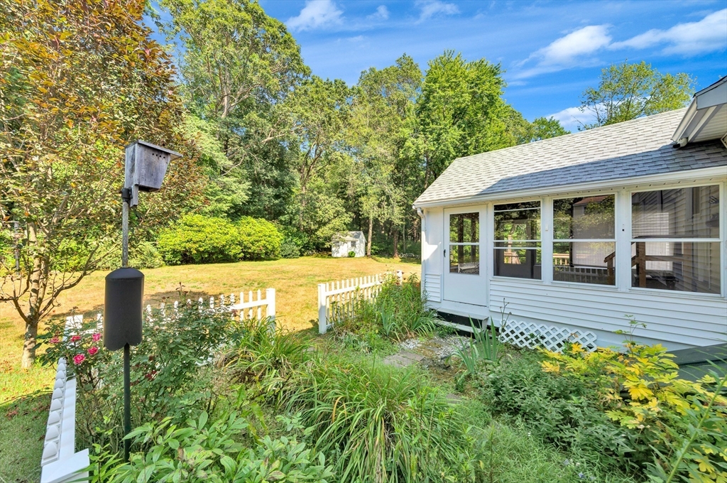 443 A North Road Bedford, MA 01730 - Photo 32 of 36 a view of a house with a yard