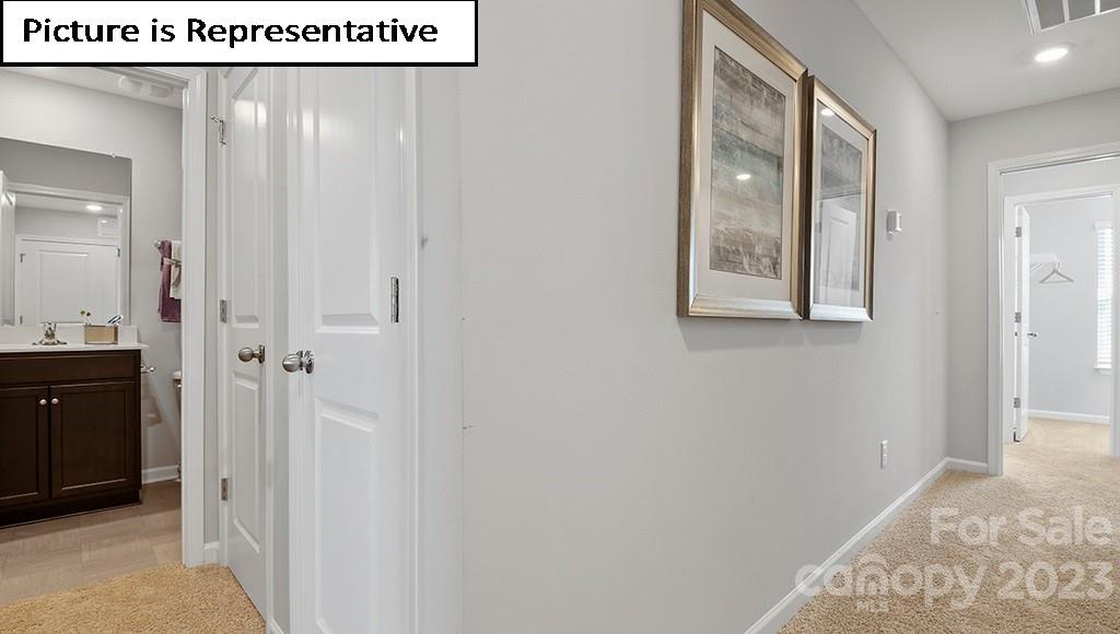 9027 Lowfalls Lane Charlotte, NC 28216 - Photo 13 of 27 a view of an entryway with wooden floor