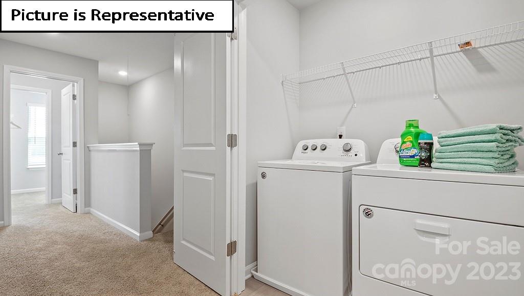 9027 Lowfalls Lane Charlotte, NC 28216 - Photo 14 of 27 a utility room with closet dryer and washer