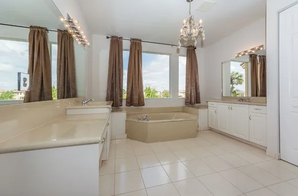a en suite bathroom with a bathtub and shower
