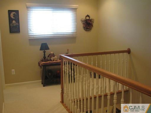 121 New Market Road Dunellen, NJ 08812 - Photo 14 of 23 a view of hallway with window