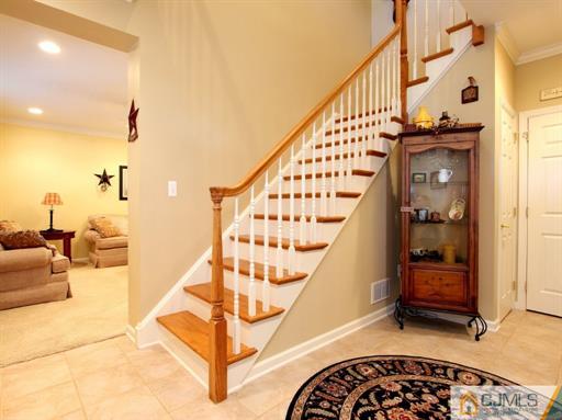 121 New Market Road Dunellen, NJ 08812 - Photo 7 of 23 a view of entryway livingroom and hall
