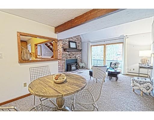 2 Clover Hill Road Acton, MA 01720 - Photo 3 of 11 a living room with furniture and a fireplace