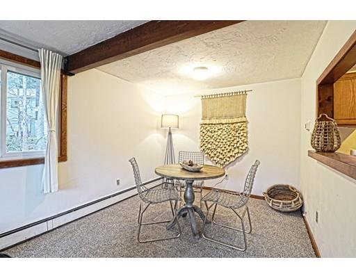 2 Clover Hill Road Acton, MA 01720 - Photo 4 of 11 a view of a dining room with furniture and wooden floor