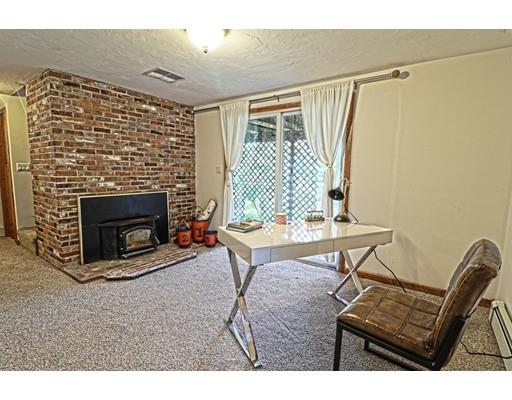 2 Clover Hill Road Acton, MA 01720 - Photo 6 of 11 a living room with furniture and a fireplace