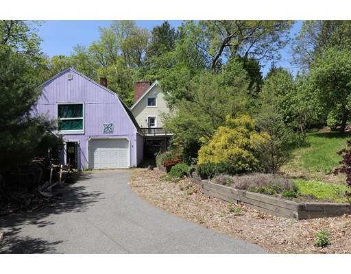 2 Clover Hill Road Acton, MA 01720 - Photo 9 of 11 a front view of a house with a yard