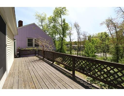 2 Clover Hill Road Acton, MA 01720 - Photo 10 of 11 a view of balcony with wooden floor and fence