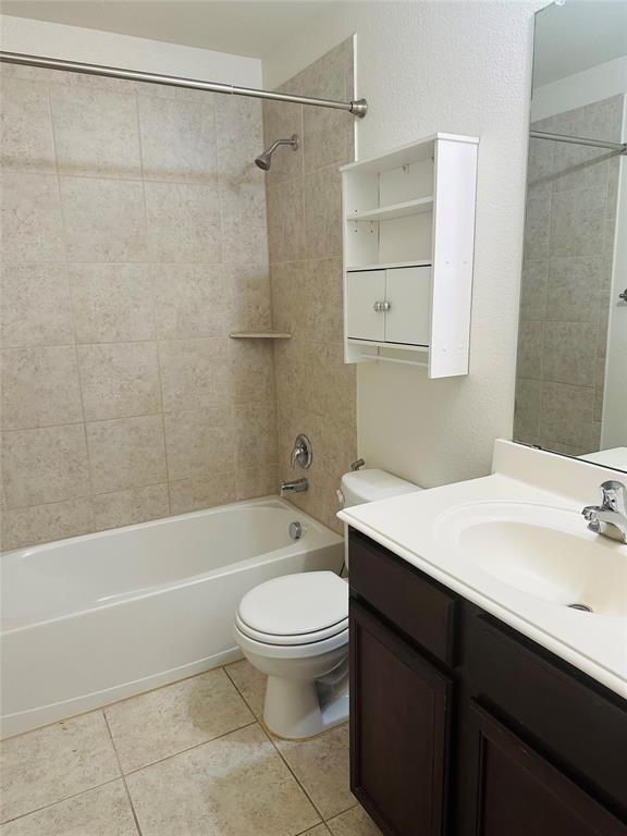 1314 Tamarack Drive Princeton, TX 75407 - Photo 12 of 12 a bathroom with a sink a toilet and shower