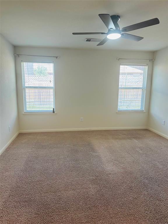 1314 Tamarack Drive Princeton, TX 75407 - Photo 8 of 12 a view of an empty room with a window