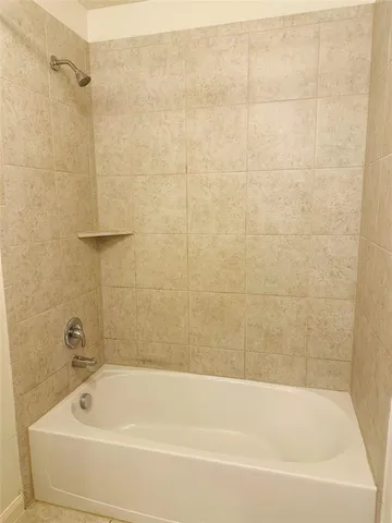 a bathroom with a bathtub