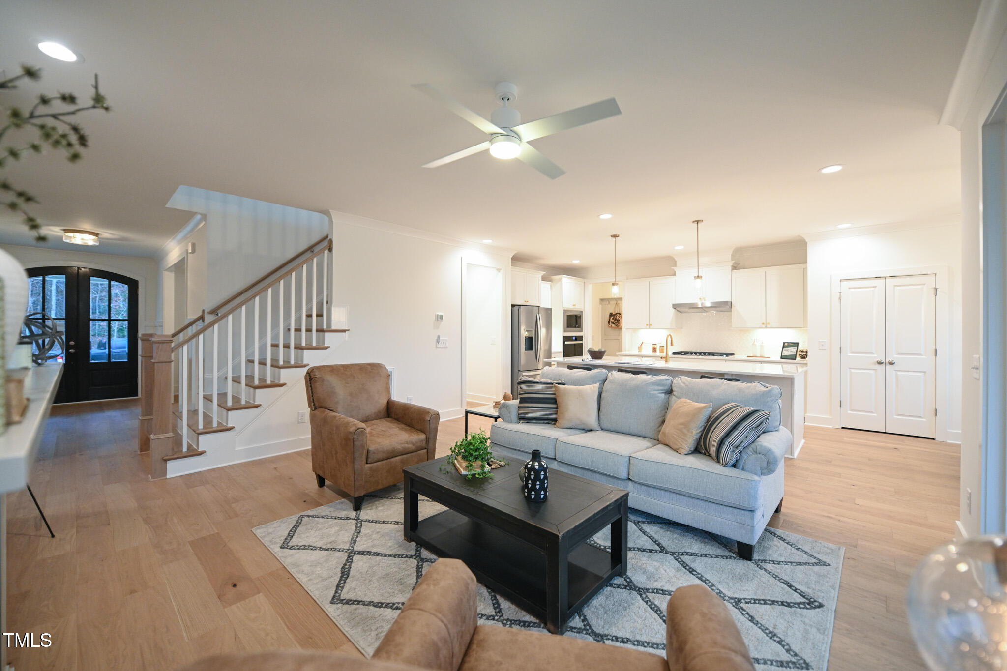 143 Sallyport Court Raleigh, NC 27603 - Photo 11 of 46 a living room with furniture and kitchen view