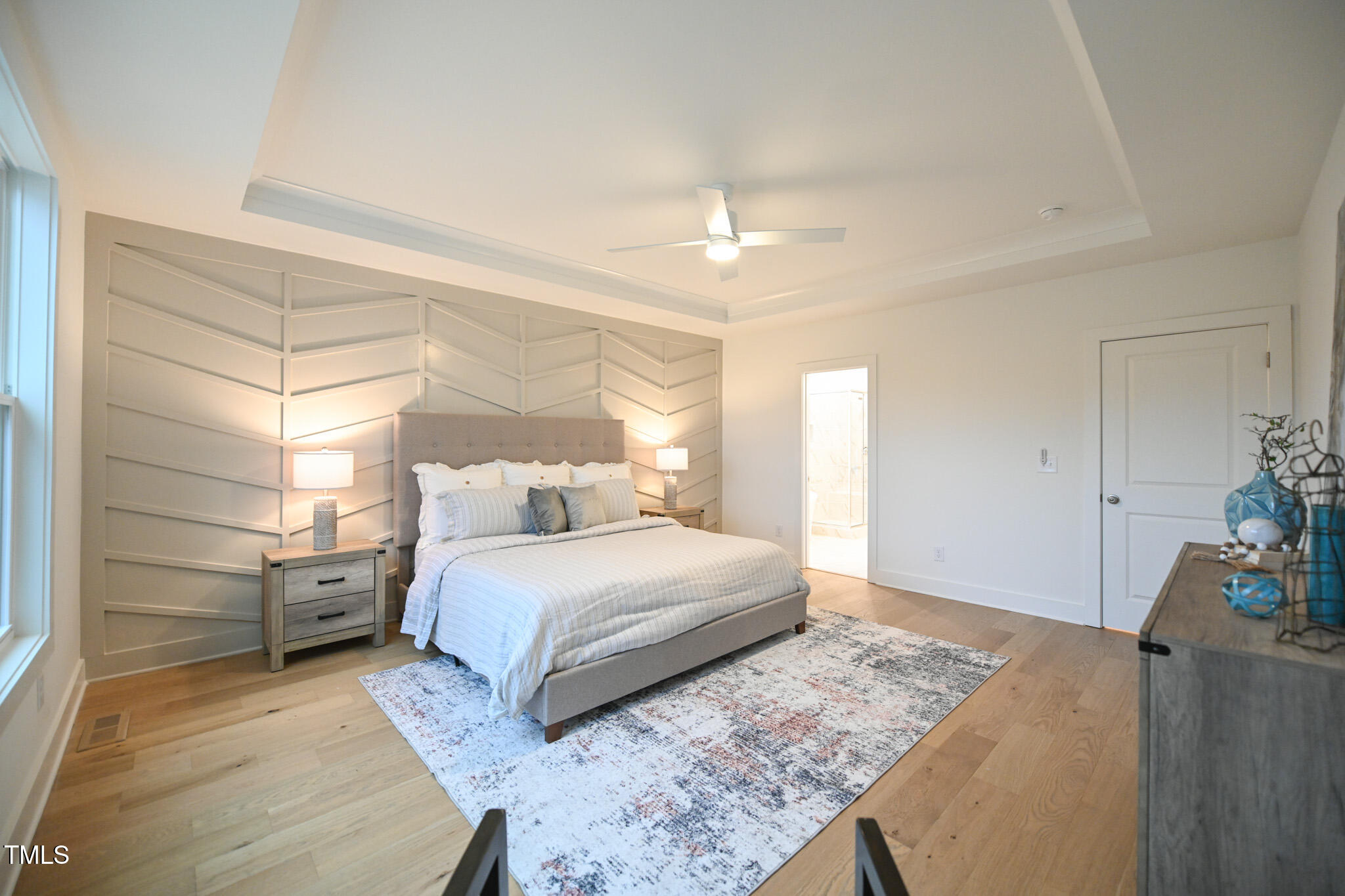 143 Sallyport Court Raleigh, NC 27603 - Photo 21 of 46 a bedroom with a bed and a mirror