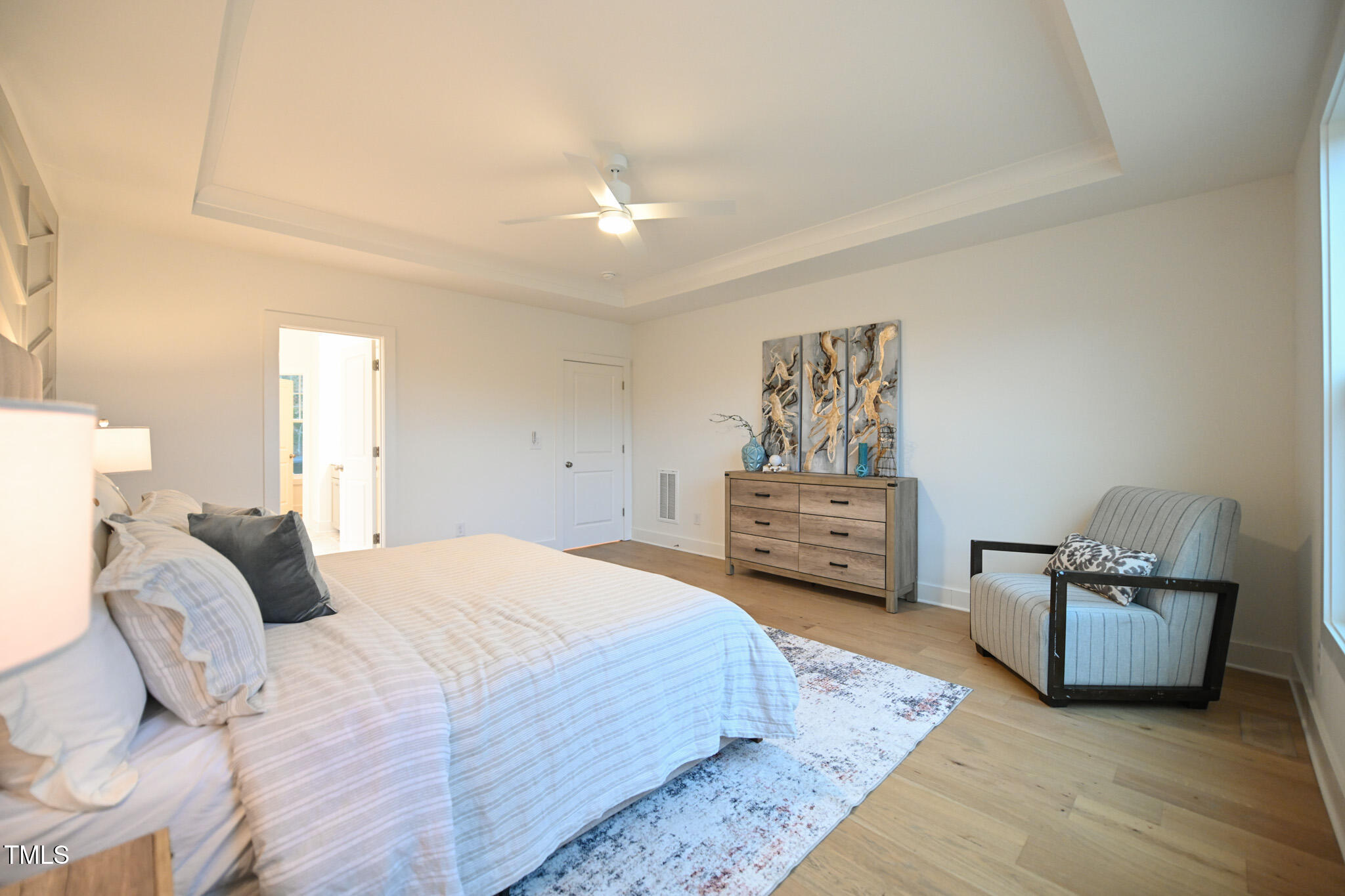 143 Sallyport Court Raleigh, NC 27603 - Photo 22 of 46 a bedroom with a bed and furniture