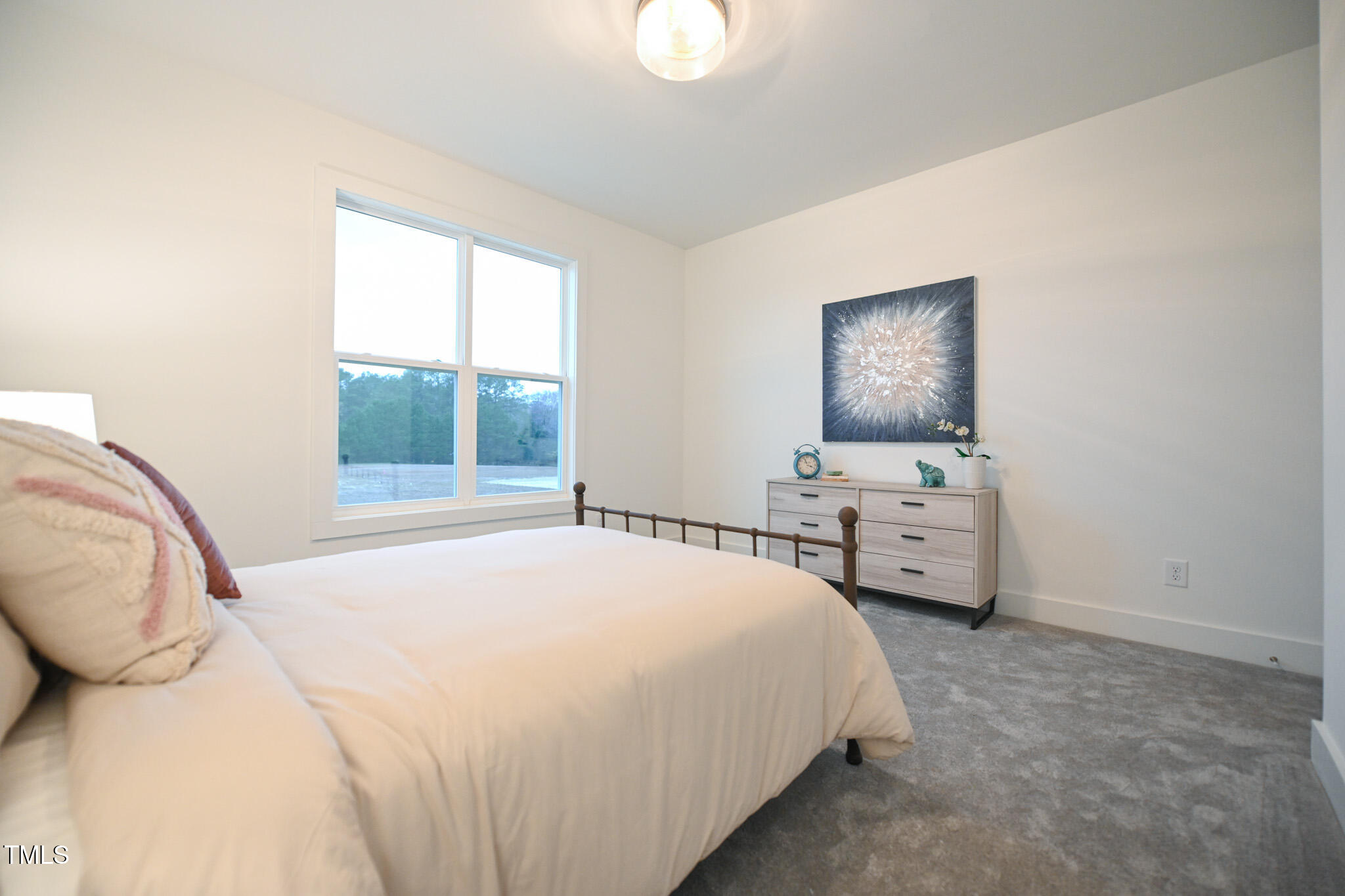 143 Sallyport Court Raleigh, NC 27603 - Photo 29 of 46 a bedroom with bed and window