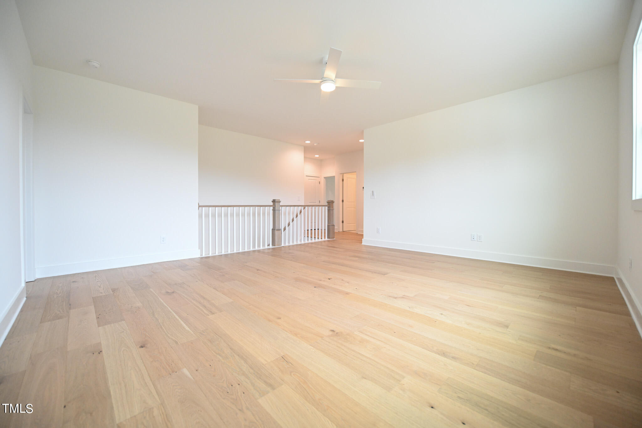 143 Sallyport Court Raleigh, NC 27603 - Photo 33 of 46 a view of empty room with wooden floor