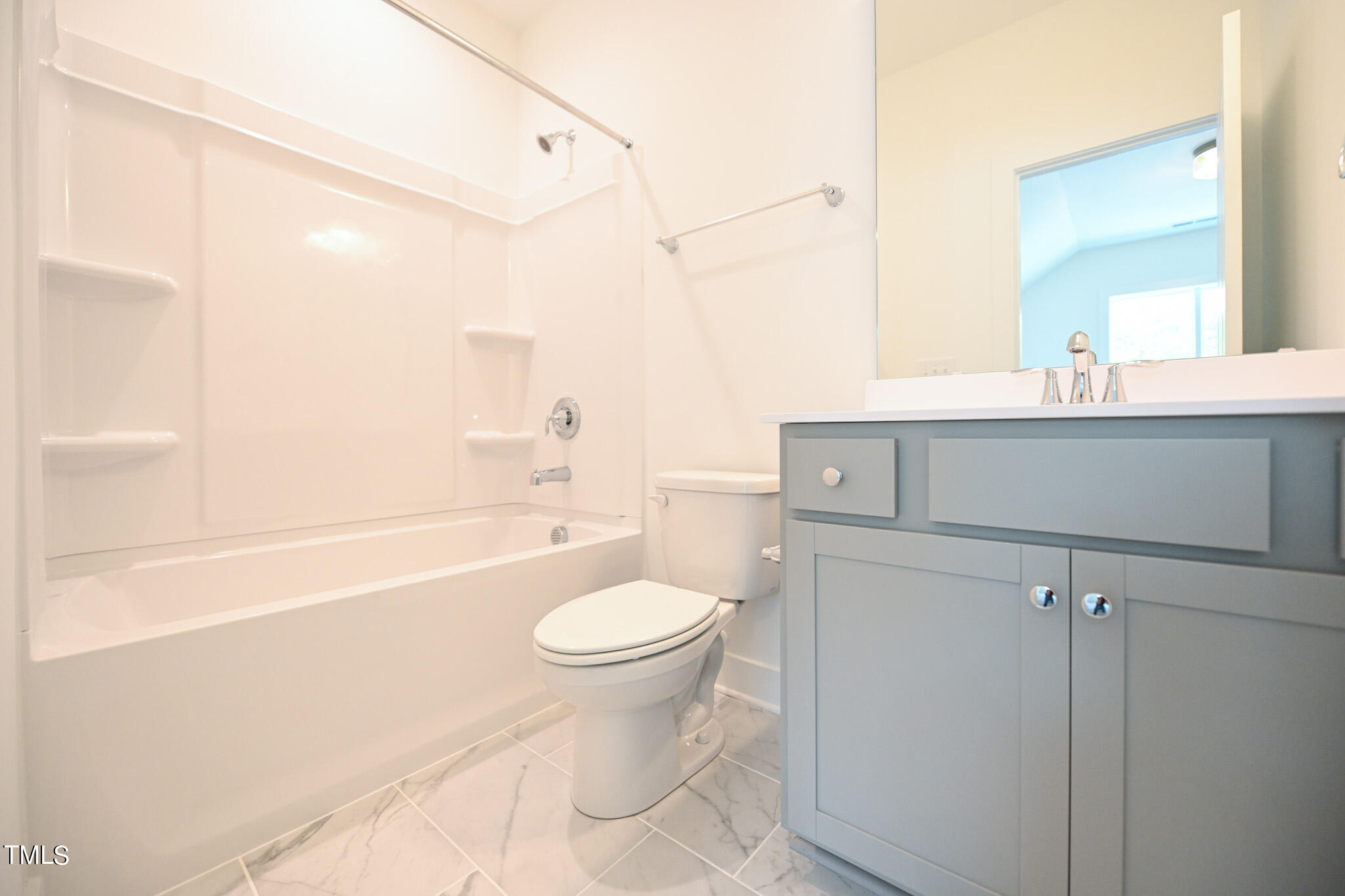 143 Sallyport Court Raleigh, NC 27603 - Photo 36 of 46 a bathroom with a sink a toilet and shower