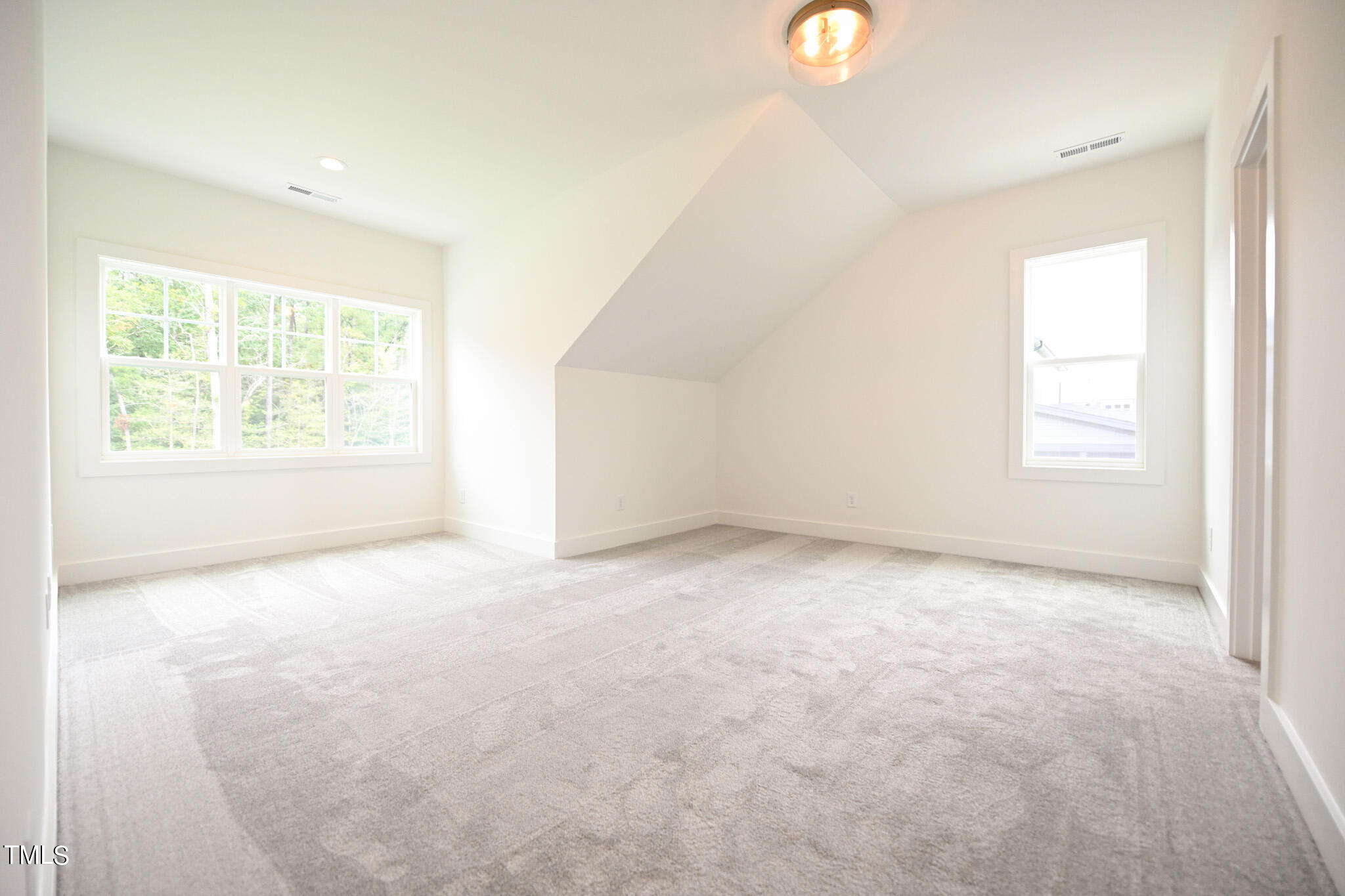 143 Sallyport Court Raleigh, NC 27603 - Photo 37 of 46 an empty room with windows