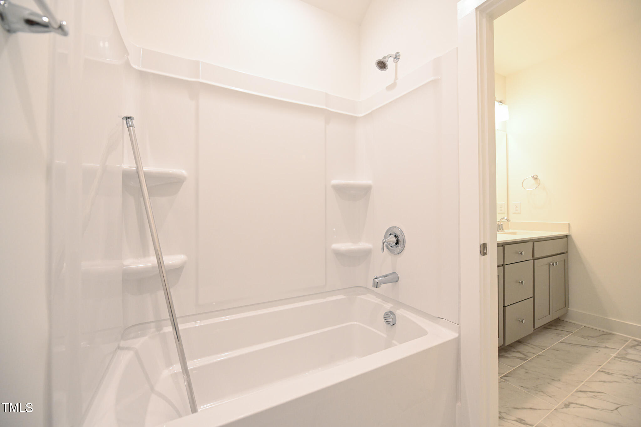 143 Sallyport Court Raleigh, NC 27603 - Photo 40 of 46 a bathroom with a tub a sink and a shower