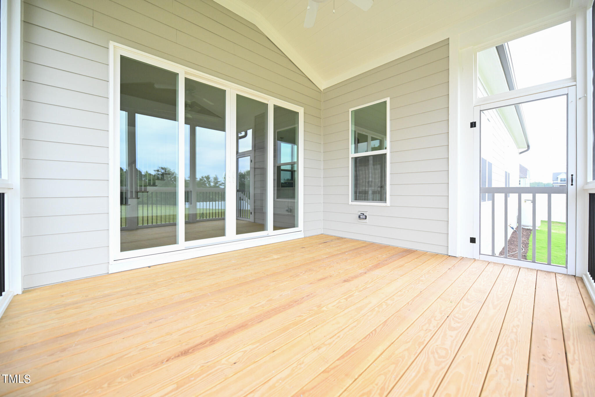 143 Sallyport Court Raleigh, NC 27603 - Photo 43 of 46 a view of an empty room with a balcony