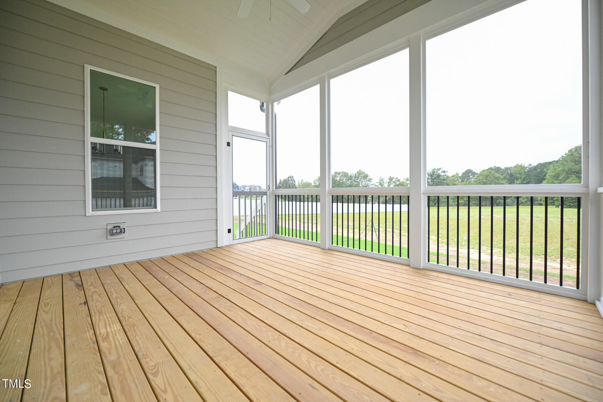 143 Sallyport Court Raleigh, NC 27603 - Photo 44 of 46 a view of a wooden deck