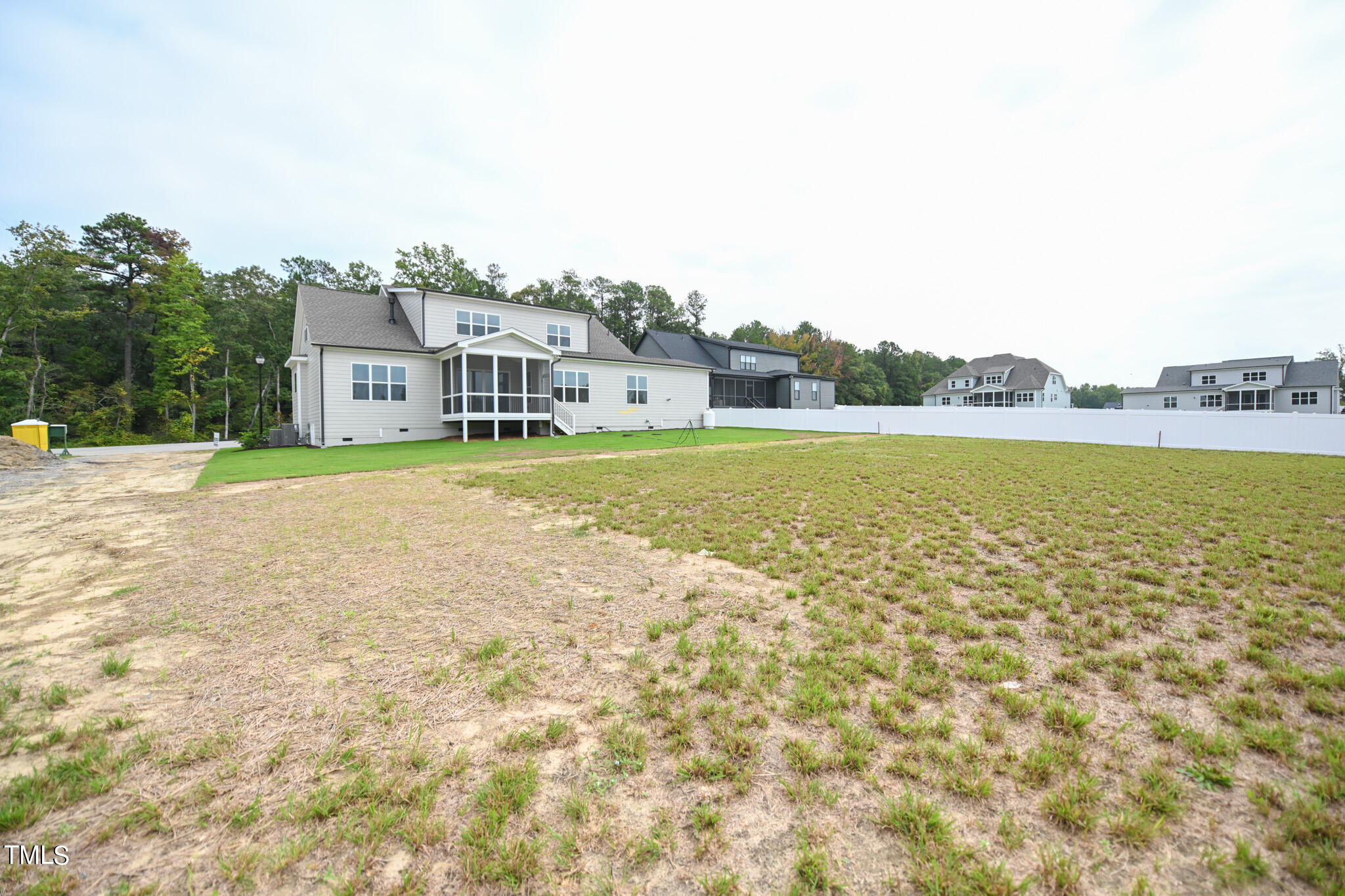 143 Sallyport Court Raleigh, NC 27603 - Photo 46 of 46 a front view of a house with a yard and ocean