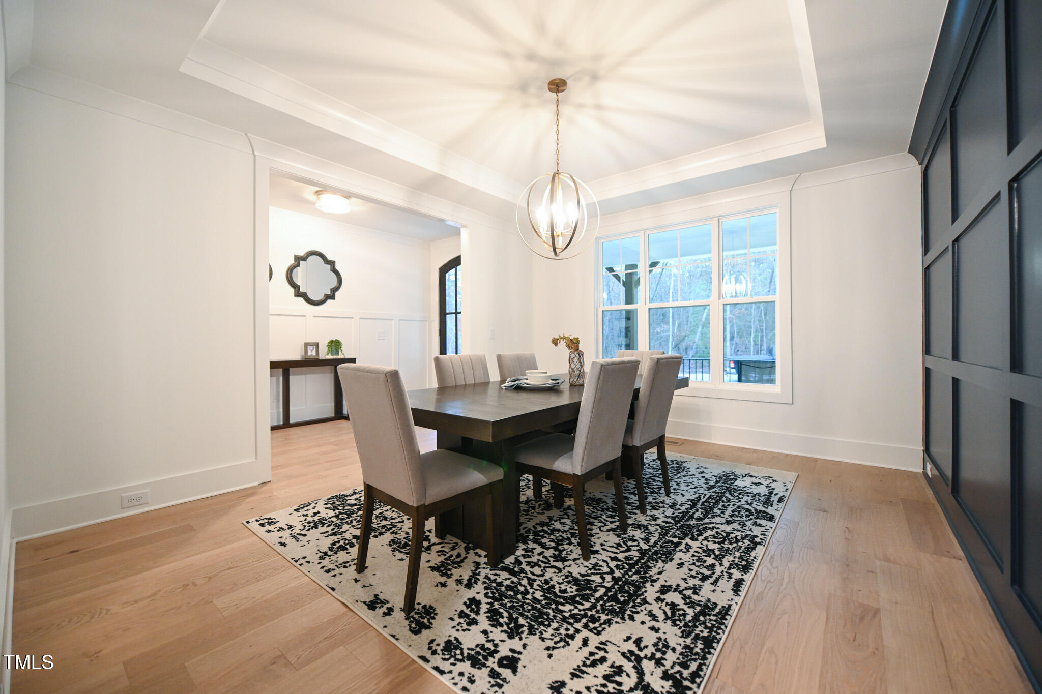 143 Sallyport Court Raleigh, NC 27603 - Photo 6 of 46 a view of a dining room with furniture window and wooden floor