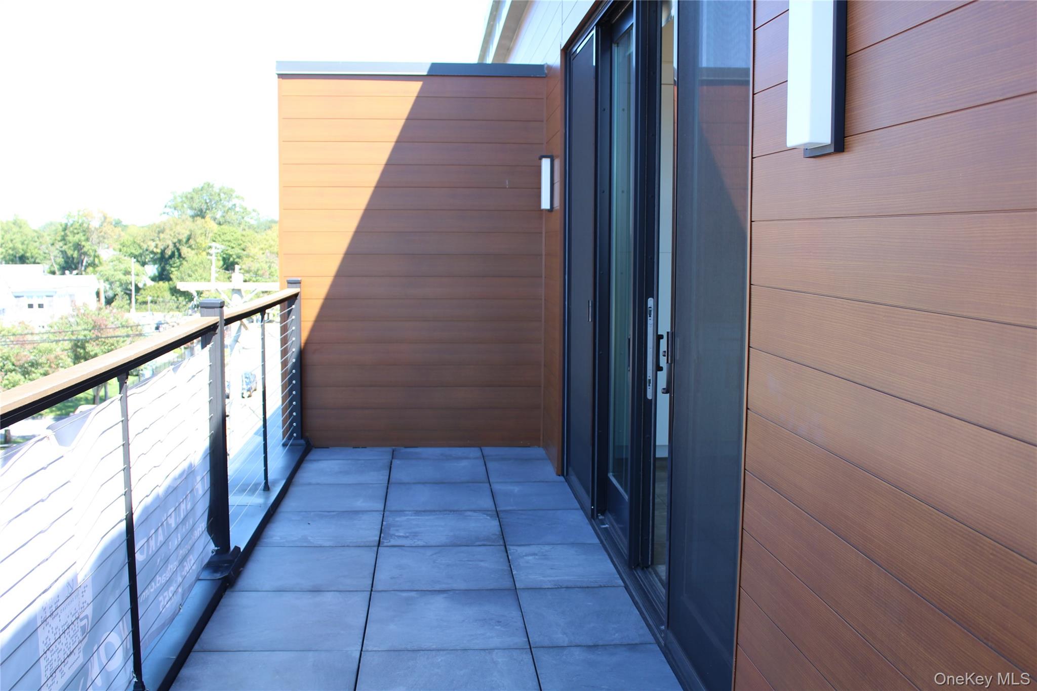 331 East Main Street, Unit 404 Riverhead, NY 11901 - Photo 5 of 5 a view of balcony