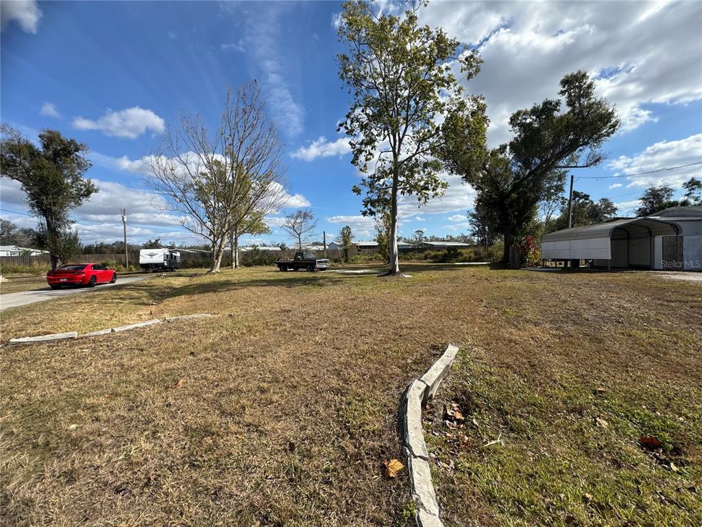 11854 Southwest Loop Terrace Arcadia, FL 34269 - Photo 7 of 7 a view of outdoor space with garden
