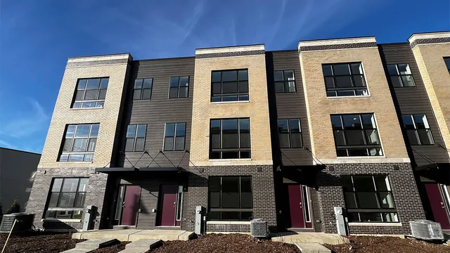 a front view of a multi story building