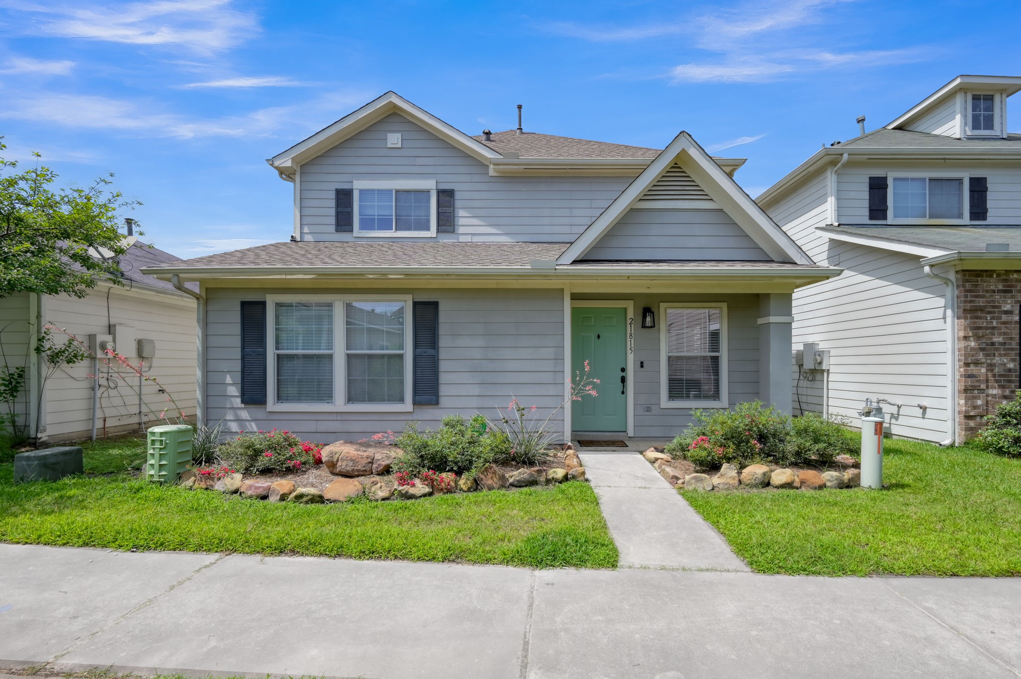 21815 Mossy Field Lane Spring, TX 77388 - Photo 1 of 39 Charming 4-bedroom, 2.2-bath home with inviting curb appeal, covered front porch, and beautifully landscaped front yard.