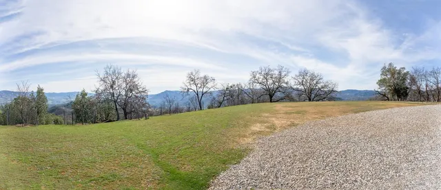 a view of an ocean and mountain