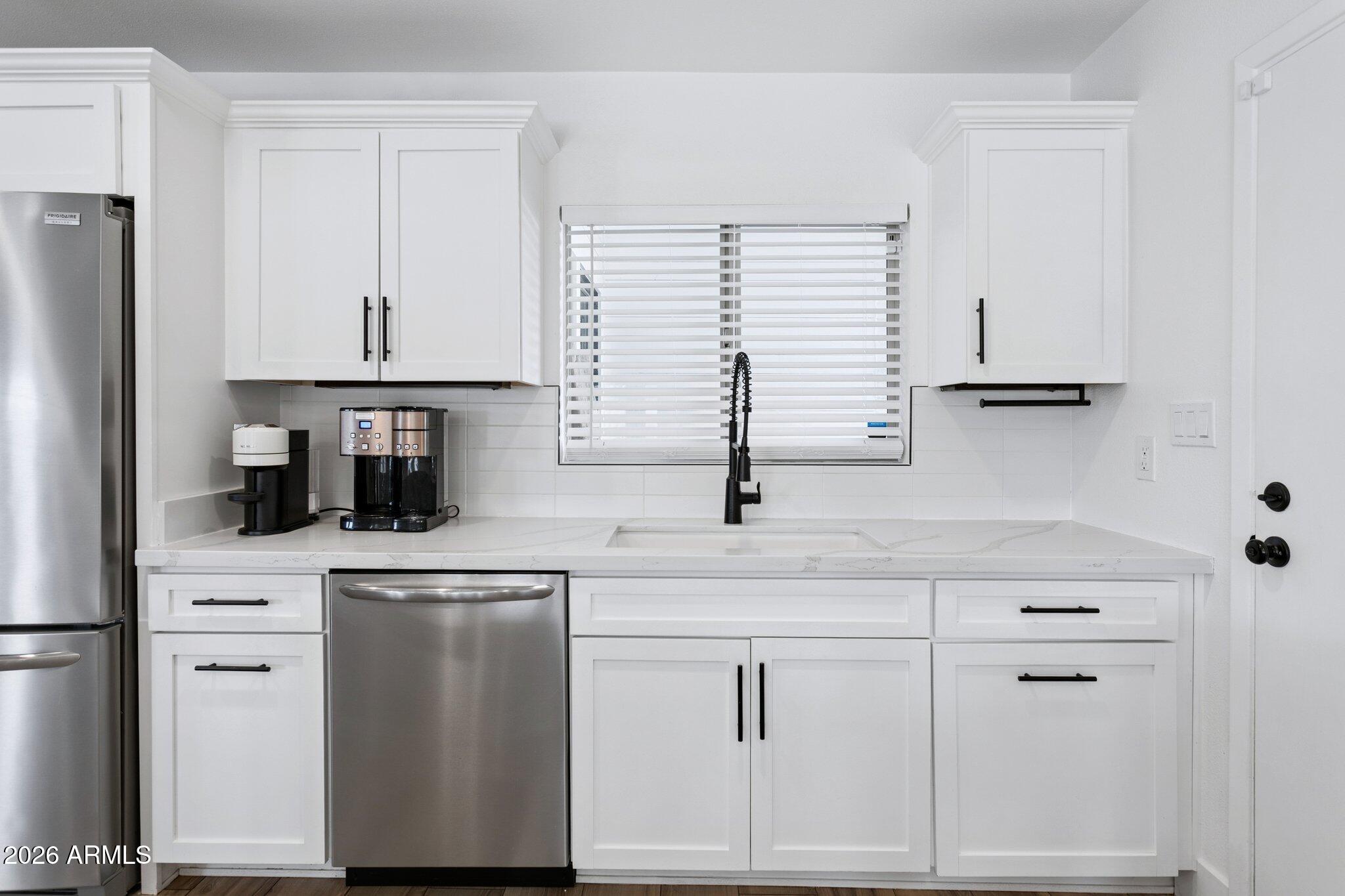 1715 West Orchid Lane Phoenix, AZ 85021 - Photo 12 of 62 Kitchen sink with windows