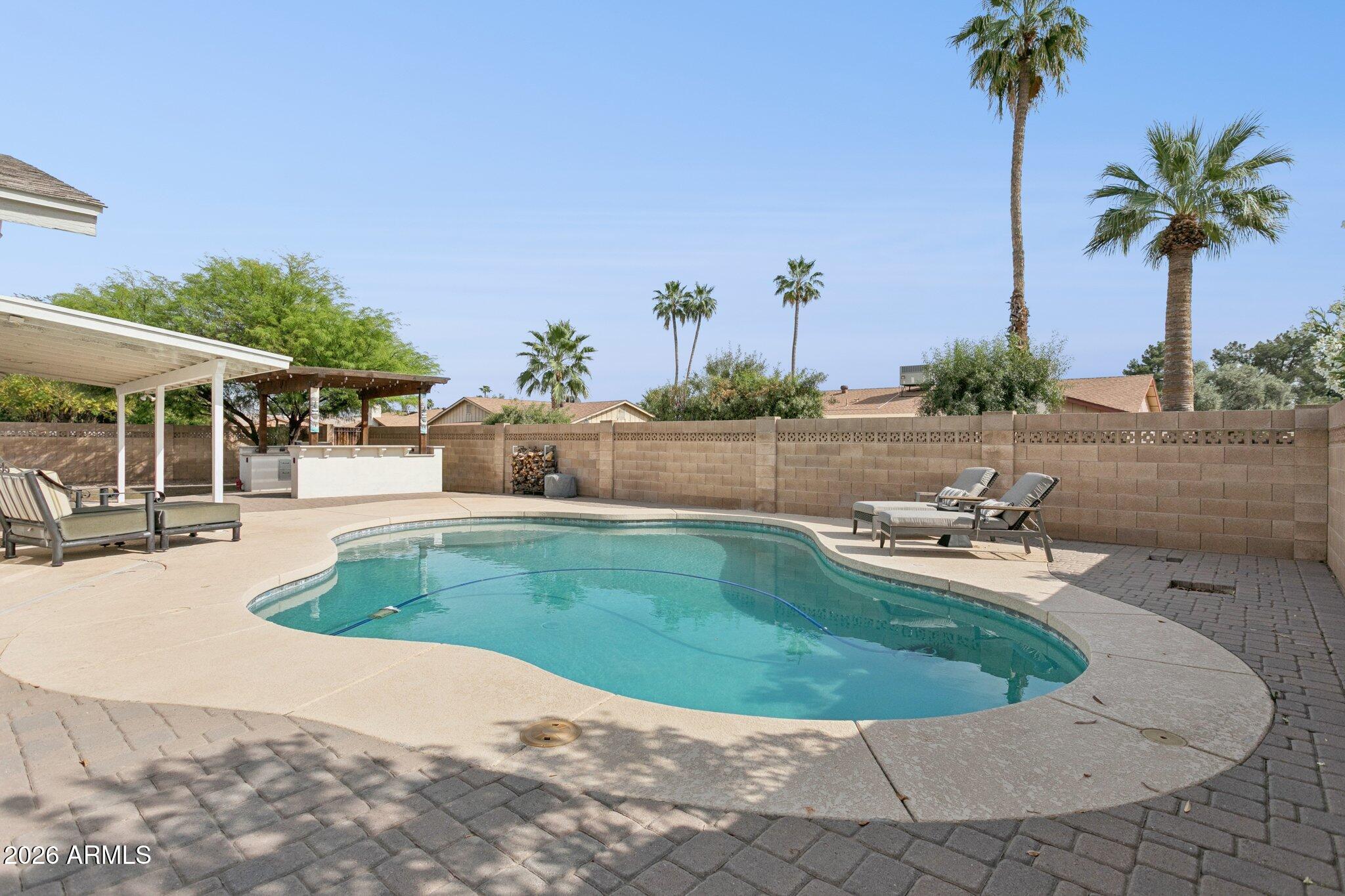 1715 West Orchid Lane Phoenix, AZ 85021 - Photo 39 of 62 Pool and expansive patio