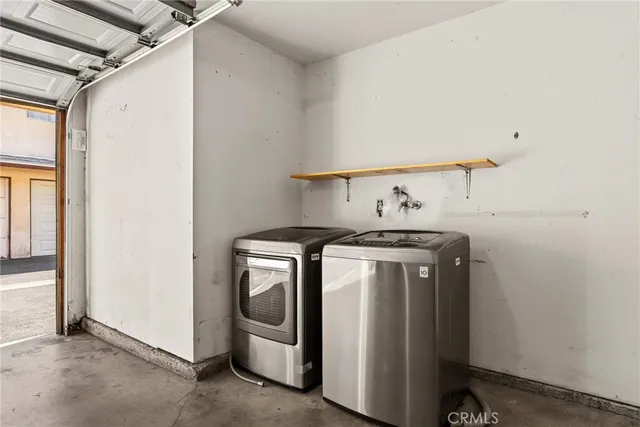 a view of an empty room with a garage