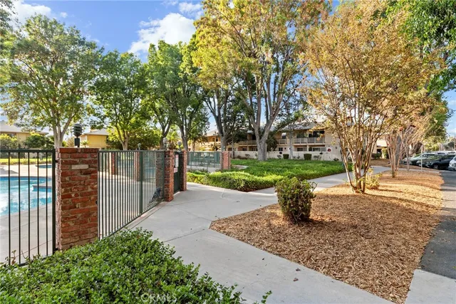 a view of a swimming pool with a patio