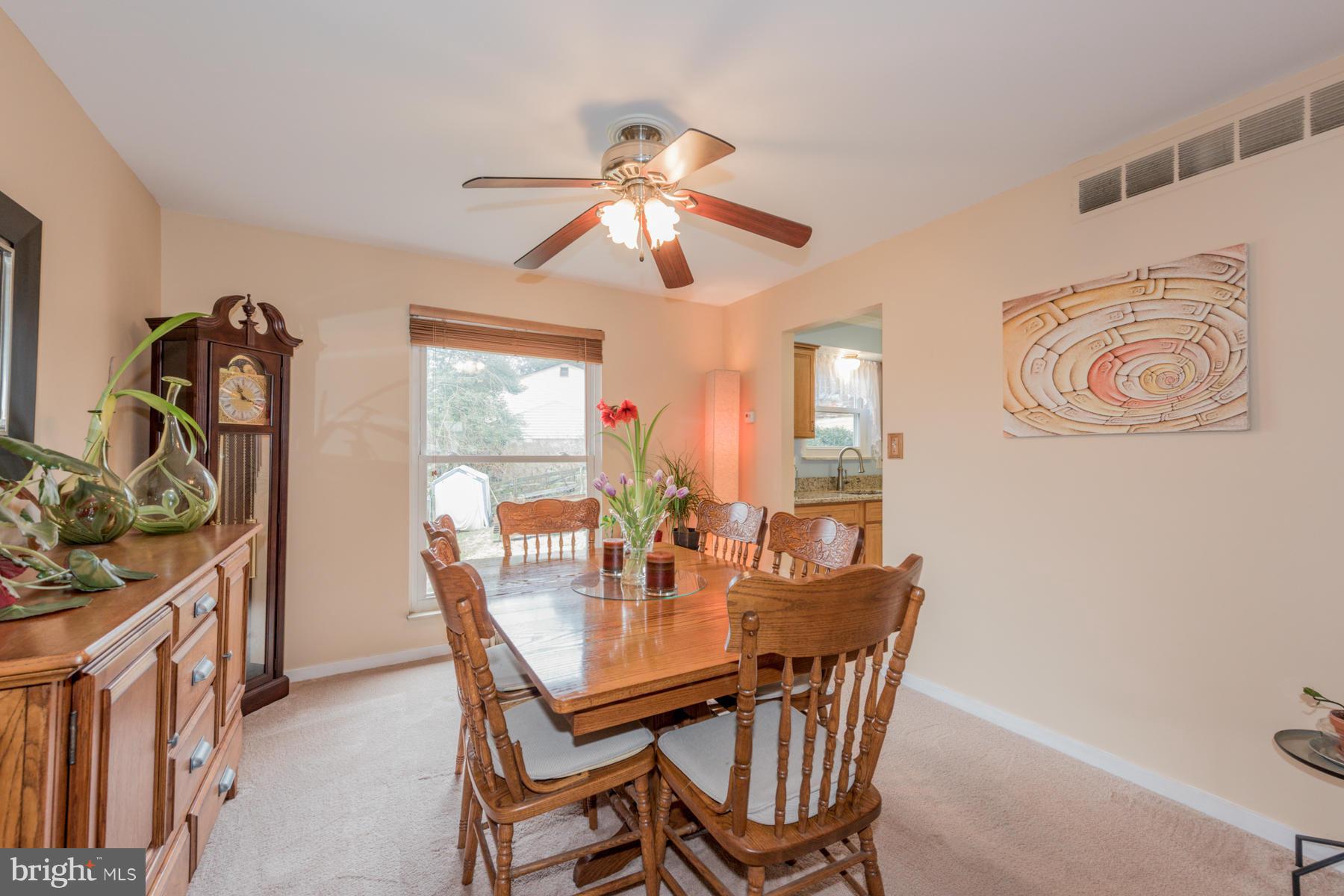 6166 Stevens Forest Road Columbia, MD 21045 - Photo 9 of 28 a dining room with furniture and window