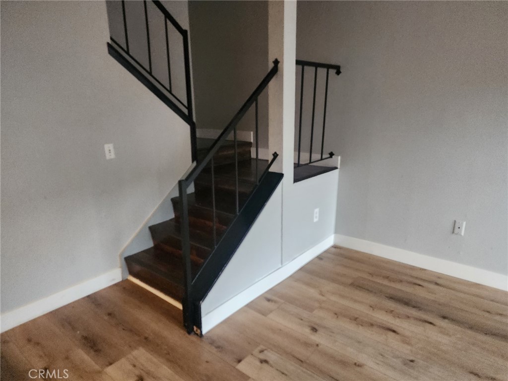 4877 Jackson Street, Unit C Riverside, CA 92503 - Photo 5 of 12 a view of entryway and hall with wooden floor