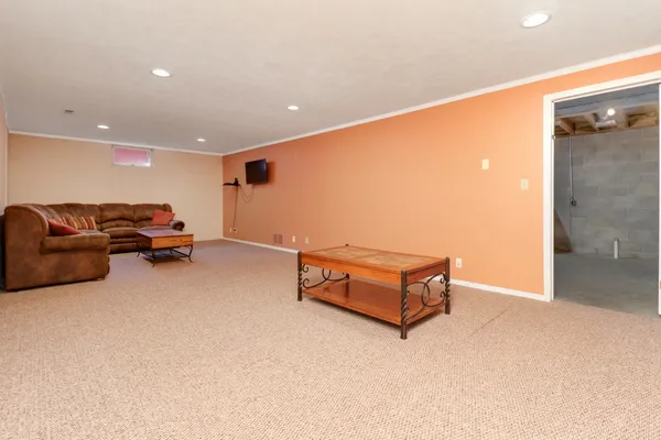 a house view with a sitting space and garden