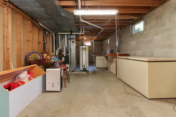 a front view of house with yard and trees