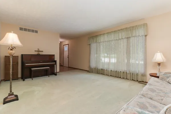 a view of a livingroom with furniture
