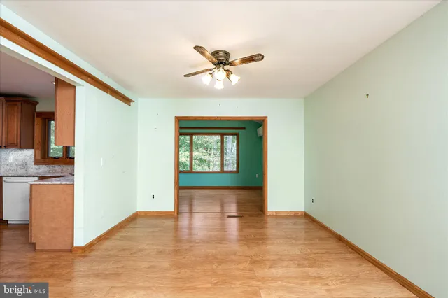 a view of an empty room and window