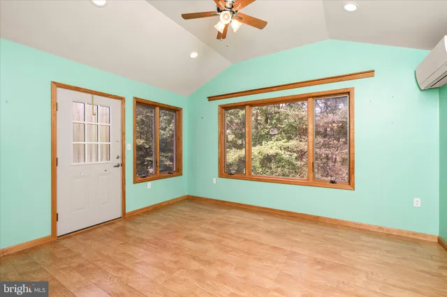 an empty room with windows