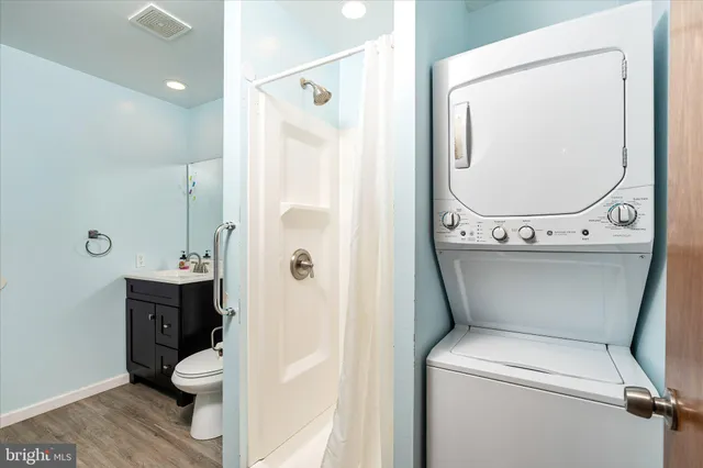 a bathroom with a toilet and a sink
