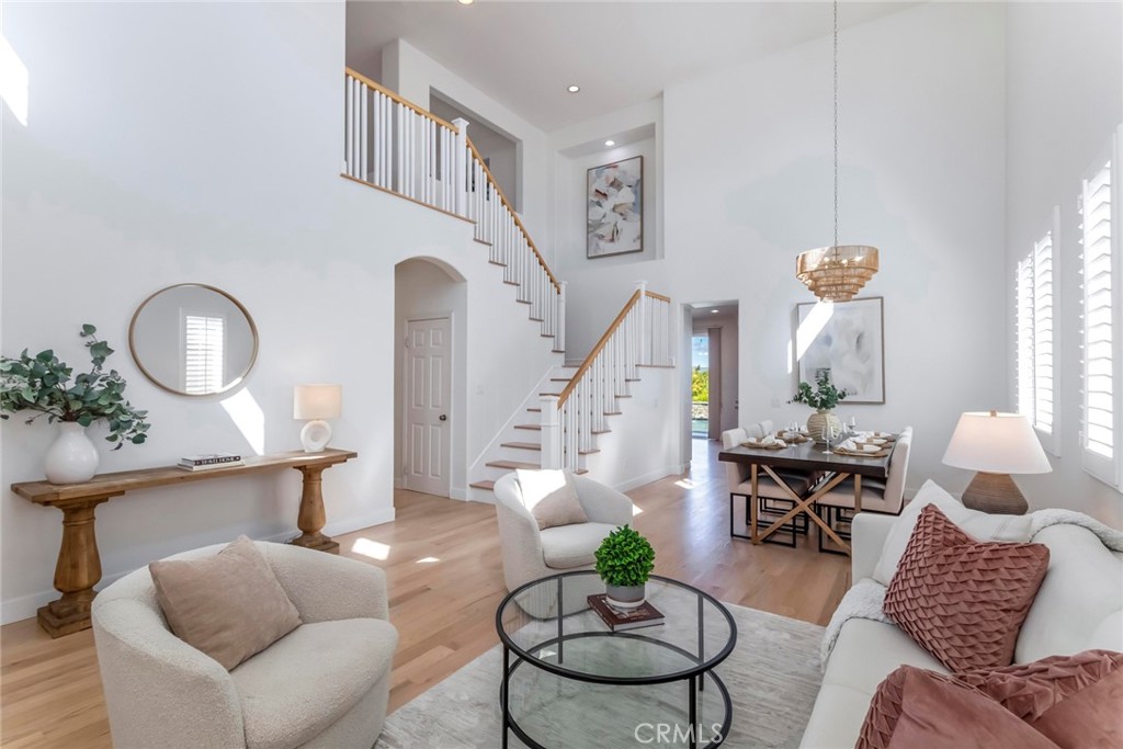 26413 Ocasey Place Stevenson Ranch, CA 91381 - Photo 12 of 75 a living room with furniture and wooden floor