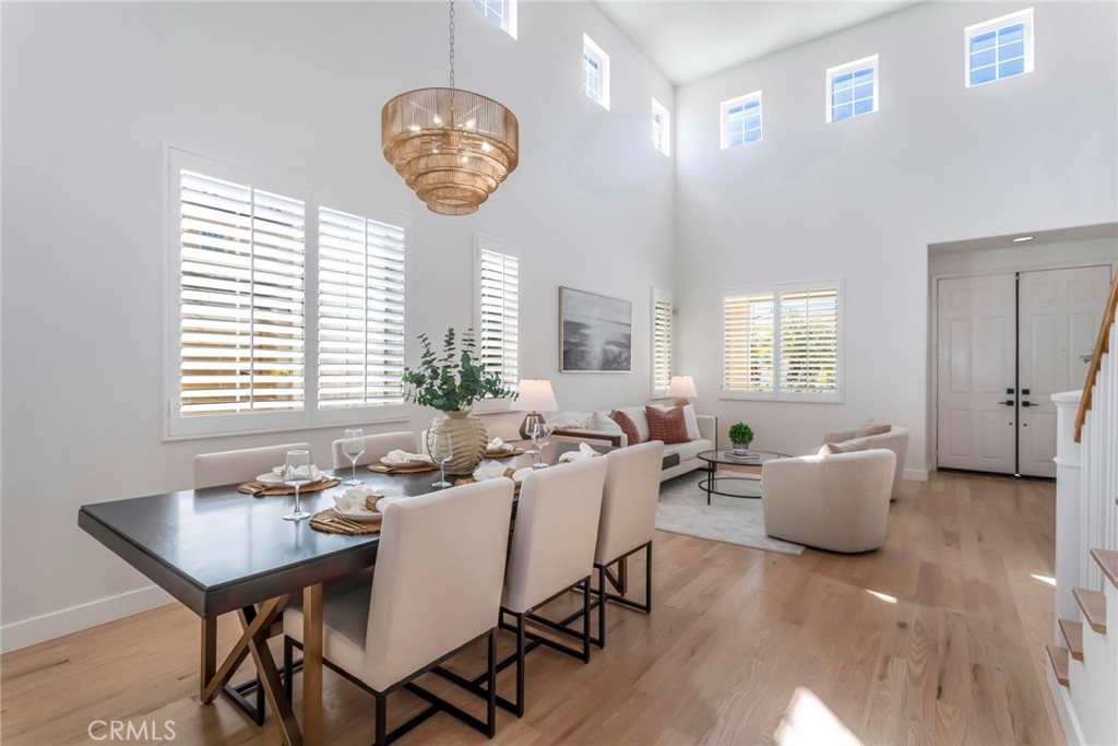 26413 Ocasey Place Stevenson Ranch, CA 91381 - Photo 15 of 75 a view of a dining room with furniture and windows