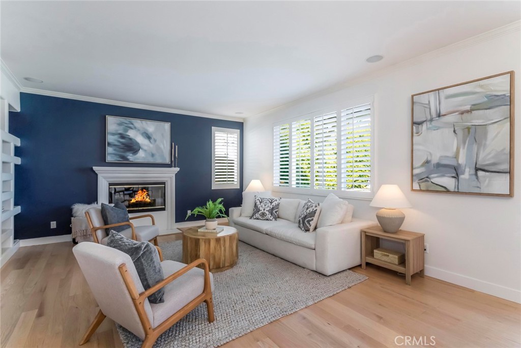 26413 Ocasey Place Stevenson Ranch, CA 91381 - Photo 18 of 75 a living room with furniture large window and a fireplace