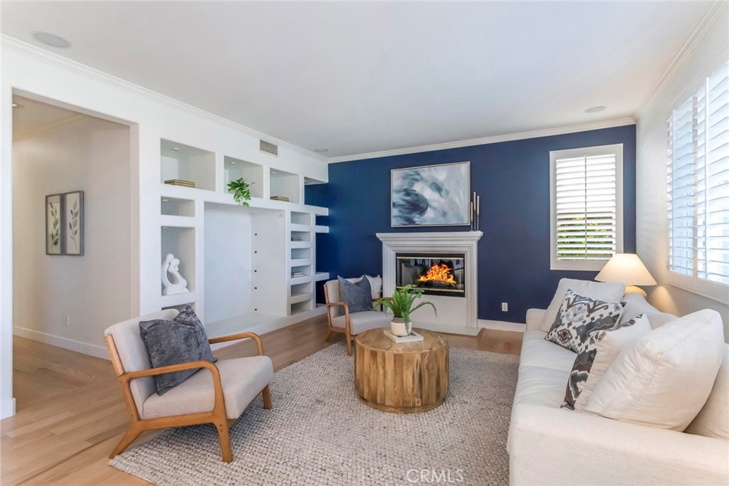 26413 Ocasey Place Stevenson Ranch, CA 91381 - Photo 19 of 75 a living room with furniture and a fireplace